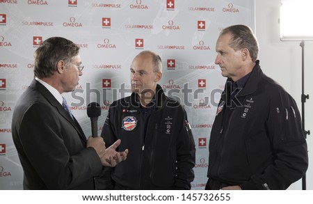 NEW YORK - JULY 10: Francois Barras conducts interview with Andre Borschberg, Bertrand Piccard at dinner to celebrate Solar Impulse plane arrival in NYC at Center 548 on July 10, 2013 in New York City