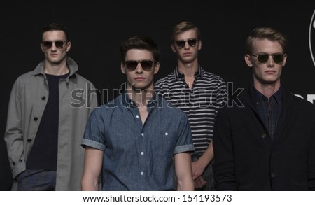 NEW YORK - SEPTEMBER 06: Models show off clothes during Spring/Summer 2014 Fashion week for Todd Snyder collection at Lincoln Center on September 06, 2013 in New York City