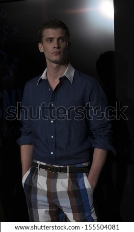 NEW YORK - SEPTEMBER 06: Model shows off clothes during Spring/Summer 2014 Fashion week for Todd Snyder collection at Lincoln Center on September 06, 2013 in New York City