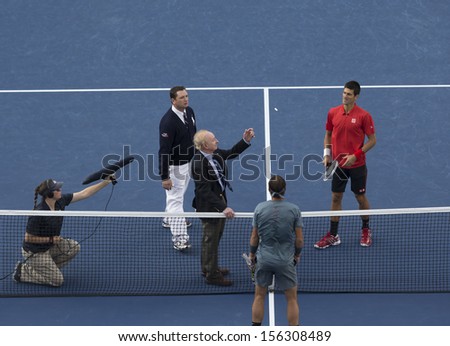 NEW YORK - SEPTEMBER 9: Rod Laver tosses coin at US Open final match between Rafael Nadal of Spain & Novak Djokovic of Serbia at USTA Billie Jean King National Tennis Center on September 9 2013 in NYC