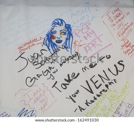 NEW YORK - NOVEMBER 11: Messages posted on message board during Artpop Pop Up: A Lady Gaga Gallery in Meatpacking District on November 11, 2013 in New York City