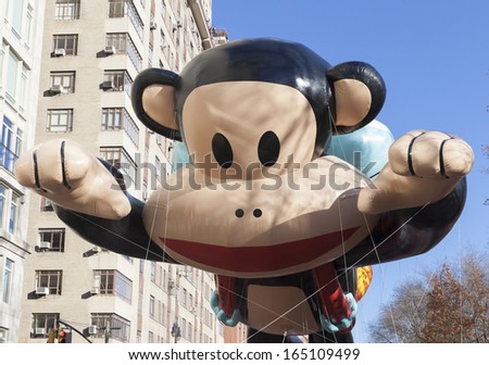 NEW YORK - NOVEMBER 28: Julius balloon is flown low because of weather condition at the 87th Annual Macy\'s Thanksgiving Day Parade on November 28, 2013 in New York City.