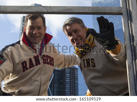NEW YORK - NOVEMBER 28: NHL legends Mike Richter & Cam Neely ride the float at the 87th Annual Macy\'s Thanksgiving Day Parade on November 28, 2013 in New York City.