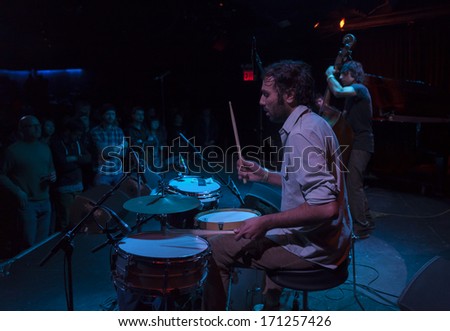 NEW YORK, NY - JANUARY 10, 2014: Dawn of Midi trio performs on stage as part of New York City Winter Jazz Festival at Le Poisson Rouge