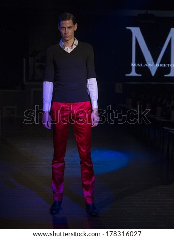NEW YORK, NY - FEBRUARY 11, 2014: Model walks runway for Dinner with Edward presentation by Malan Breton at Fall/Winter 2014 Fashion week at 510 West 42nd street