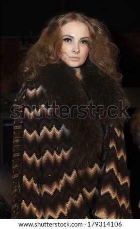 NEW YORK, NY - FEBRUARY 10, 2014: Models show off dress for Enchanted... A Mid Winter Night\'s Dream presentation by Stacey Bendet at New York Fall/Winter 2014 Fashion Week at McKittrick Hotel