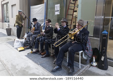 NEW YORK, NY - APRIL 26, 2014: Jazz band performs on street before 23rd annual Jazz loft party for Jazz Foundation of America at Hudson Studios