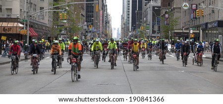 New York, NY - May 04, 2014: Unidentified people ride bicycles during TD Five Boro Bike Tour on streets of New York