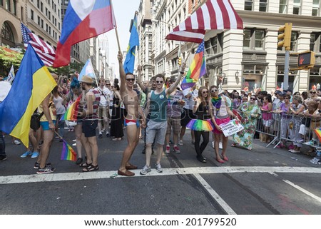 New York, NY USA - June 30, 2014: Protesters against anti-gay policies of Russian government during annual 43rd Pride Parade on Fifth Avenue in Manhattan
