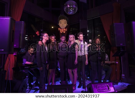 NEW YORK, NY - JUNE 30, 2014: Catrice Joseph, Amy Spanger, Bridget Cady, MJ Rodriguez, Sam Given, Ano Okera perform at Broadway Sings For Pride benefit concert at Toshi\'s Living Room at Flatiron Hotel