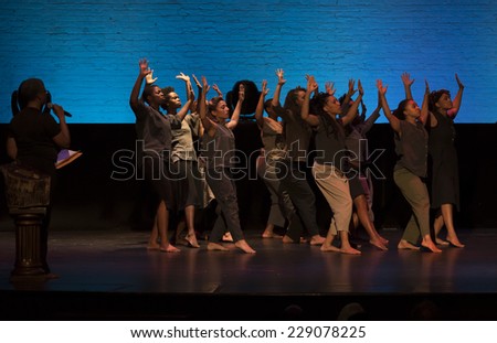 New York, NY - October 20, 2014: Members of Urban Bush Women dance group perform on stage Shelter by Jawole Willa Jo Zollar during the 2014 Bessies Awards at The Apollo Theater