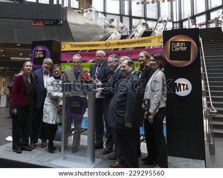 New York, NY - November 9, 2014: Cutting ribbon during opening ceremony of Fulton Center unveiled by Metropolitan Transit Authority during opening ceremony on Broadway in Manhattan