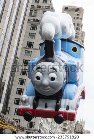 New York, NY USA - November 27, 2014: Thomas the Tank Engine balloon is flown at the 88th Annual Macy\'s Thanksgiving Day Parade along Columbus Circle