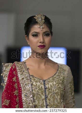New York, NY - November 28, 2014: Model walks runway for MARIA.B. at Pakistan Fashoin Week in Studio 05