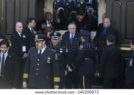 NEW YORK, NY - DECEMBER 27, 2014: NYC police commisioner Bill Bratton & Rikki Klieman attend Christ Tabernacle Church for the funeral of slain New York City Police Officer Rafael Ramos
