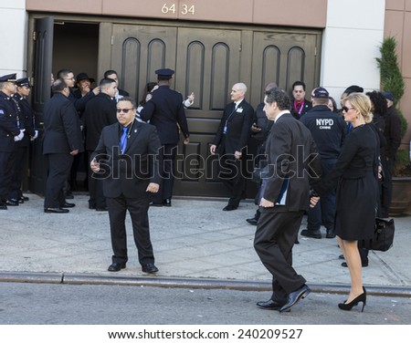 NEW YORK, NY - DECEMBER 27, 2014: NY State governor Andrew Cuomo & Sandra Lee arrive at Christ Tabernacle Church for the funeral of slain New York City Police Officer Rafael Ramos