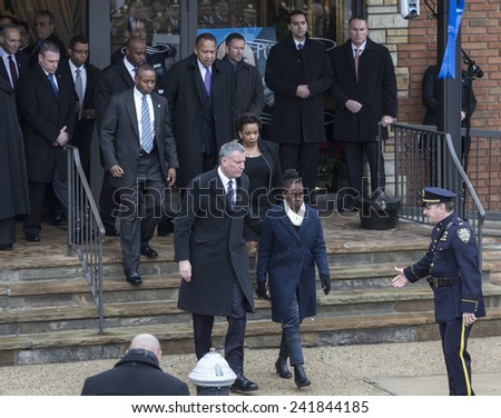 Brooklyn, NY - Jan 04, 2015: Bill De Blasio, Chirlane McCray, Loretta Lynch nominee for attorney General attend ceremony at Aievoli Funeral Home for the funeral of slain NYC Police Officer Wenjian Liu