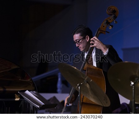 New York, NY - January 08, 2015: David Wong plays as part of Bill Charlap trio at Jazz Legends for Disability Pride concert at Quaker Friends Meeting House in Manhattan