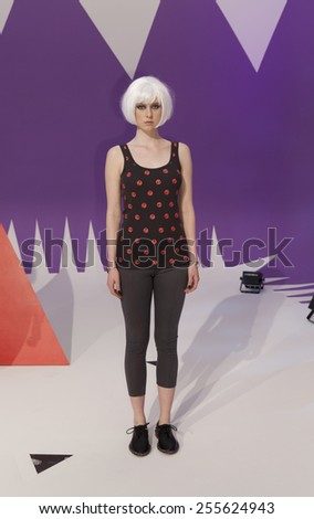 New York, NY - February 14, 2015: Model shows off dress for PRMITV WORLD presentation at Fall 2015 Fashion Week at Pier 59 Studio