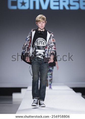 New York, NY - February 12,2015: Young model walks runway for Kids Rock Fashion show during Fall 2015 Fashion Week in Lincoln Center
