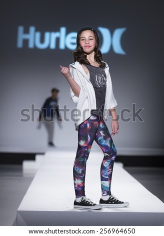 New York, NY - February 12,2015: Young model walks runway for Kids Rock Fashion show during Fall 2015 Fashion Week in Lincoln Center