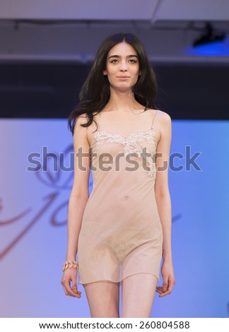 New York, NY - February 23, 2015: Model walks runway at Lingerie Fashion Night for Ajour brands design as part of Curvexpo New York in Studio 05