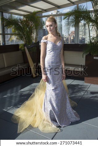 New York, NY - April 18, 2015: Models show off wedding dresses for Malan Breton bridal collection at Empire Hotel Rooftop lounge