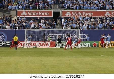 New York, NY - May 15, 2015: Jeff Larentowicz of Chicago Fire (20) controls header ball during the game between New York City Football Club and Chicago Fire FC at Yankee Stadium