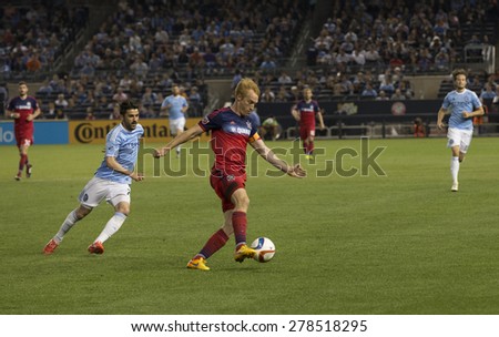 New York, NY - May 15, 2015: Jeff Larentowicz of Chicago Fire (20) controls the ball during the game between New York City Football Club and Chicago Fire FC at Yankee Stadium