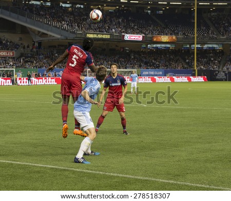 New York, NY - May 15, 2015: Lovel Palmer (5) of Chicago Fire controls header ball during the game between New York City Football Club and Chicago Fire FC at Yankee Stadium