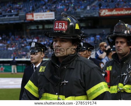 New York, NY - May 15, 2015: NYFD and NYPD Honor guards attend game between New York City Football Club and Chicago Fire FC at Yankee Stadium
