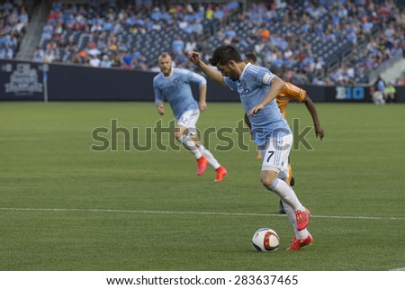 New York, NY - May 30, 2015: David Villa (7) of NYCFC controls ball during the game between New York City Football Club and Houston Dynamo at Yankee Stadium