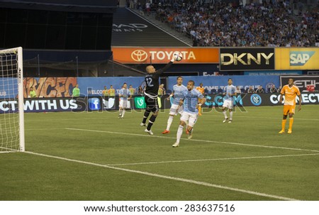 New York, NY - May 30, 2015: New York City Football Club Goalkeeper Josh Saunders saves ball during the game between New York City Football Club and Houston Dynamo at Yankee Stadium