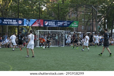 New York, NY USA - June 24, 2015: Team America (white) & team World (black) compete at soccer charity game at The 8th Steve Nash Foundation Showdown at Sarah D. Roosevelt Park