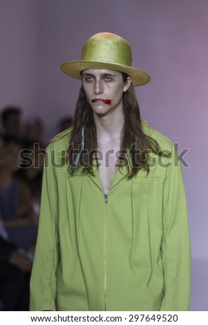 New York, NY USA - July 14, 2015: Model walks runway for Thaddeus O'Neil show during Mens fashion week S/S 2016 at Skylight Clarkson Square