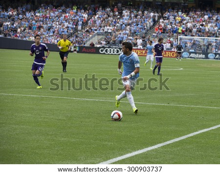 New York, NY - July 26, 2015: David Villa (7) controls ball during game between New York City Football Club and Orlando City SC at Yankee Stadium