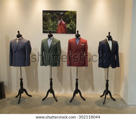 New York, NY - July 20, 2015: mens suits on display at Strong Suit Made to Measure pop up store opening  in Meatpacking district
