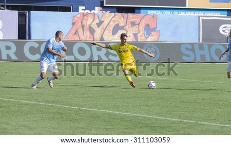 New York, NY - August 29, 2015: Ethan Finlay (13) of Columbus Crew controls ball during game between New York City FC and Columbus Crew SC at Yankee Stadium