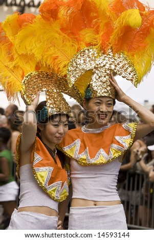 NEW YORK - JUNE 29: Asian women participate in the Pride Parade June 29, 2008 in New York City.