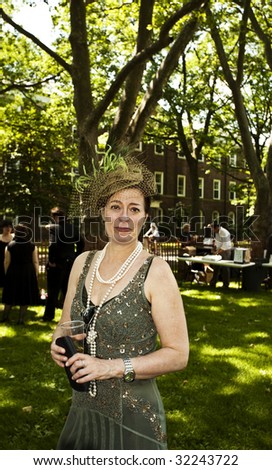 NEW YORK - JUNE 6: Woman in period clothing attends 5th Annual Jazz age concert and picnic on Governors Island on June 6 2009 in New York
