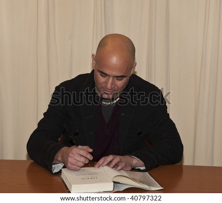 NEW YORK - NOVEMBER 12: Andre Agassi signing his book at Barnes & Noble bookstore on November 12, 2009 in New York City.