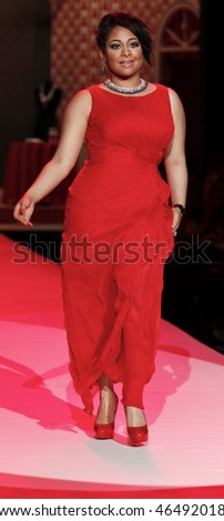 NEW YORK - FEBRUARY 11: Raven-Symone walks the runway [dress by Tadashi Shoji ] at the Heart Truth\'s Red Dress Collection for Fall 2010 during Mercedes-Benz Fashion Week on February 11, 2010 in New York