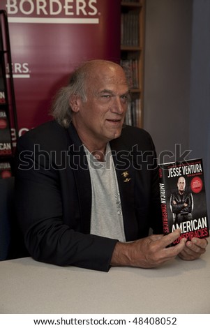 NEW YORK - MARCH 10: Minnesota Governor Jesse Ventura signing his book \'American Conspiracies\' at Borders bookstore on MARCH 10, 2010 in New York City.