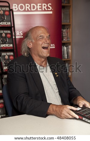 NEW YORK - MARCH 10: Minnesota Governor Jesse Ventura signing his book \'American Conspiracies\' at Borders bookstore on MARCH 10, 2010 in New York City.
