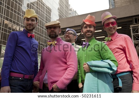 NEW YORK - APRIL 4: A group of people partakes and shows off hats in the Easter Bonnet Parade on 5th Avenue on April 4, 2010 in New York City.