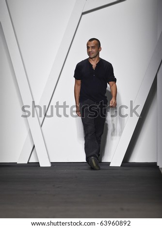 NEW YORK - SEPTEMBER 10: Designer Michael Angel walks the runway for Michael Angel Collection Guli for Spring/Summer 2011 during Mercedes-Benz Fashion Week on September 10, 2010 in New York