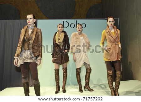 NEW YORK - FEBRUARY 15: Models from Doho pose at the Concept Korea Fall 2011 presentation for Do Ho at Mercedes-Benz Fashion Week in David Rubenstein Atrium on February 15, 2011 in New York City