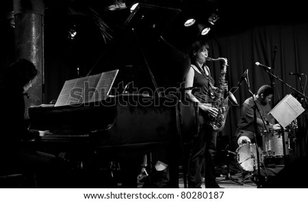 NEW YORK - JUNE 23: Kris Davis piano, Ingrid Laubrock saxophone and Tyshawn Sorey drums of Paradoxical Frog perform at Sullivan Hall bar as part of annual Undead Jazz Festival on June 23, 2011 in NYC