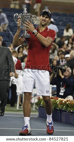 NEW YORK - SEPTEMBER 12: Novak Djokovic of Serbia winner of US Open single men championships with trophy at USTA Billie Jean King National Tennis Center on September 12, 2011 in NYC