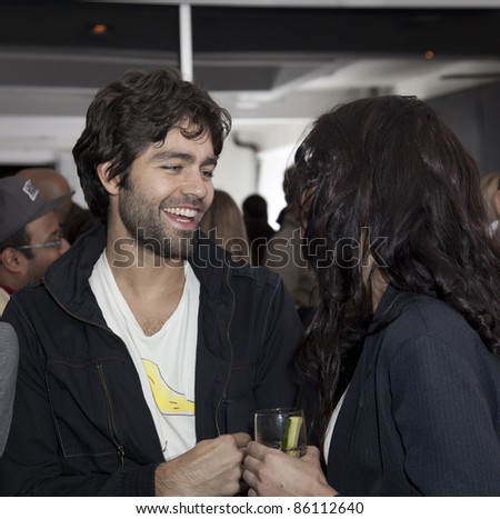 NEW YORK - OCTOBER 06: Adrian Grenier at Evole launch 100%-electric motorcycle made in USA at the party in Milk Studio in Manhattan on October 06, 2011 in New York.